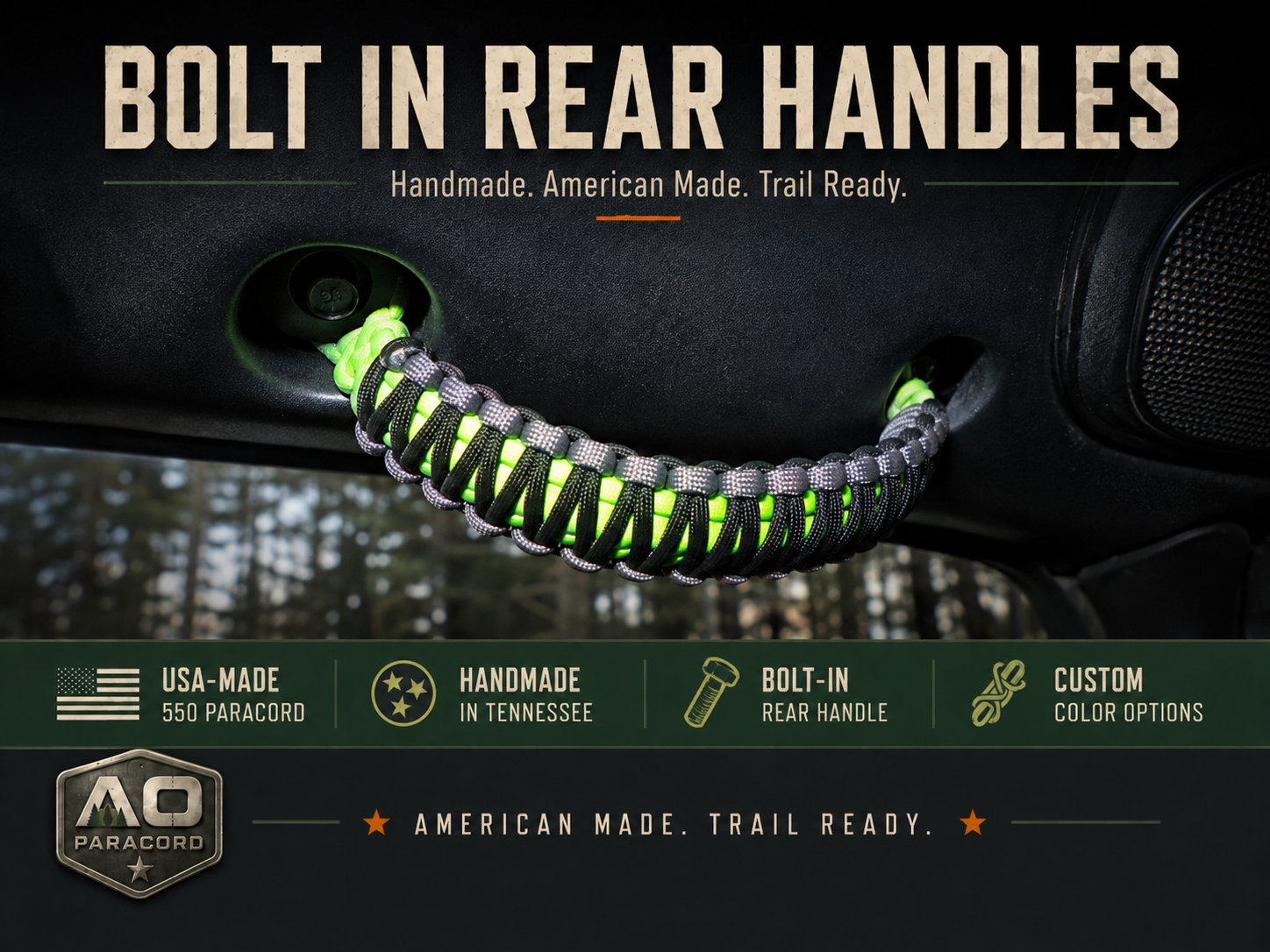 Black, gray, and neon green paracord bolt-in rear grab handle mounted overhead inside a Jeep Wrangler JKU.