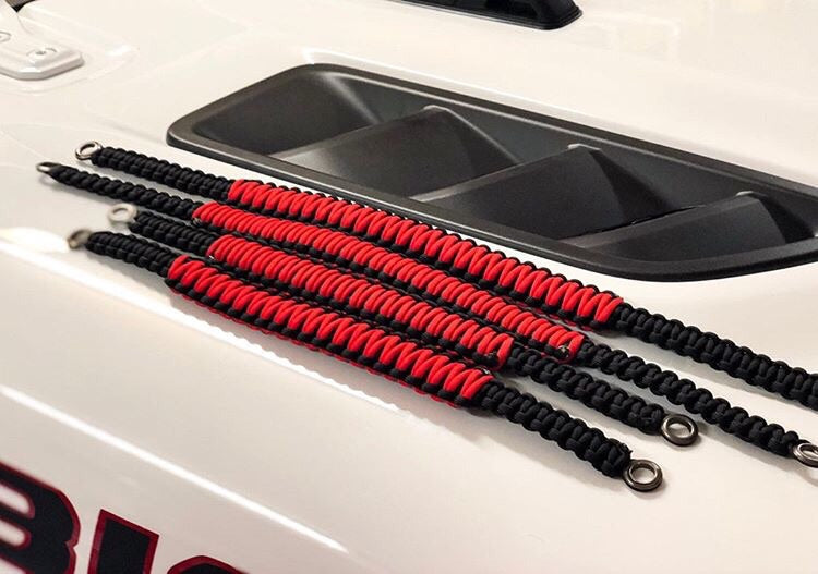 Close-up of handmade 550 paracord weave on a Jeep JLU grab handle